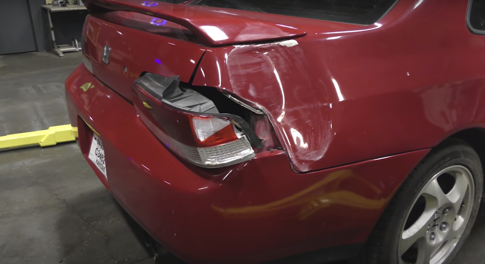 Car Wizard Wrecked Honda Prelude rear quarter